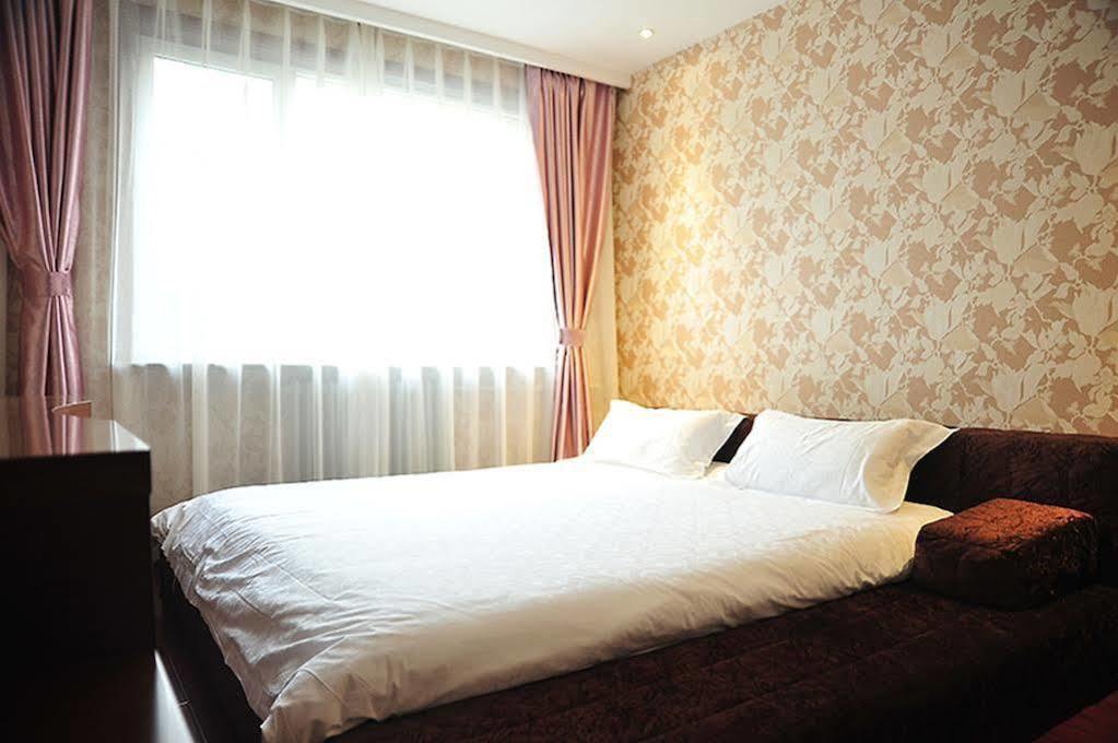 East Sacred Hotel Beijing Exterior foto
